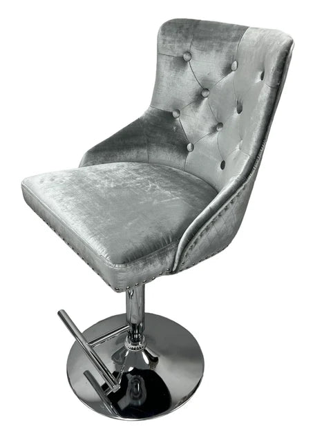 Grey velvet bar stool with a chrome base