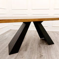 Wooden table with black metal legs first class interiors uk delivery