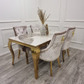 Dining table with gold legs and chairs a