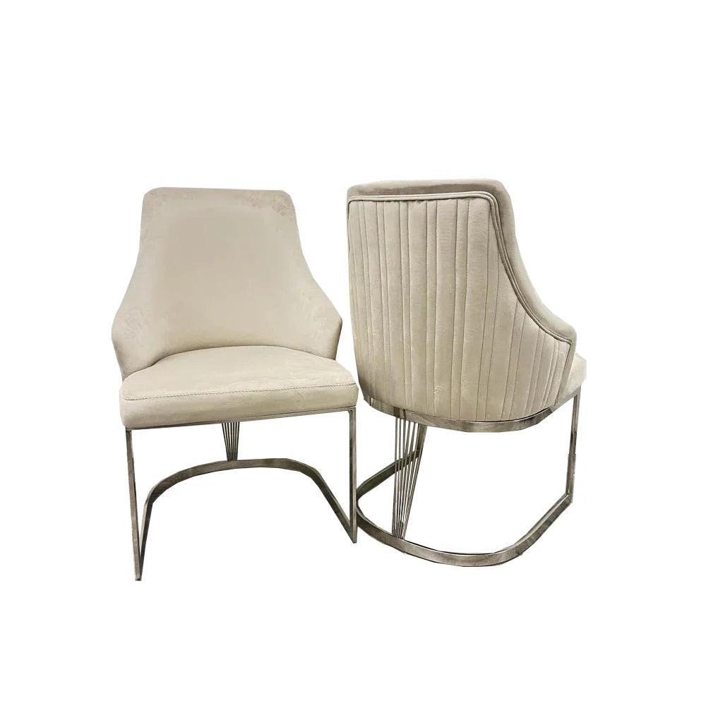 Two beige chairs with silver metal frame on a white background