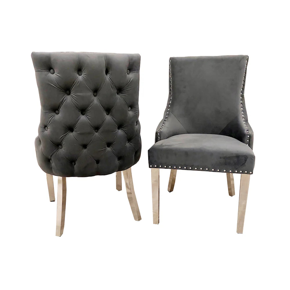 grey upholstered chairs with tufted back and silver legs first class interiors